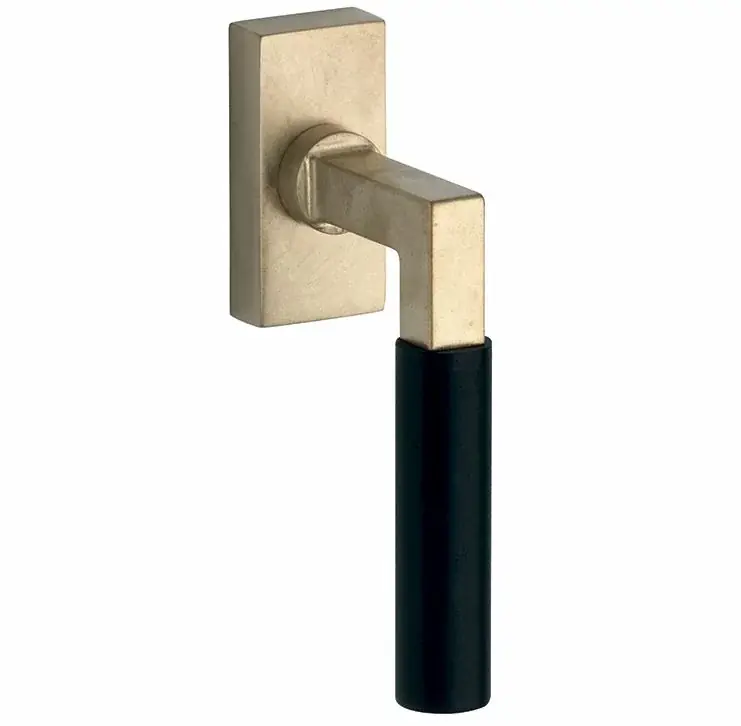 Aanbieding Draaikiepgarnituur Bauhaus ebben messing antiek
